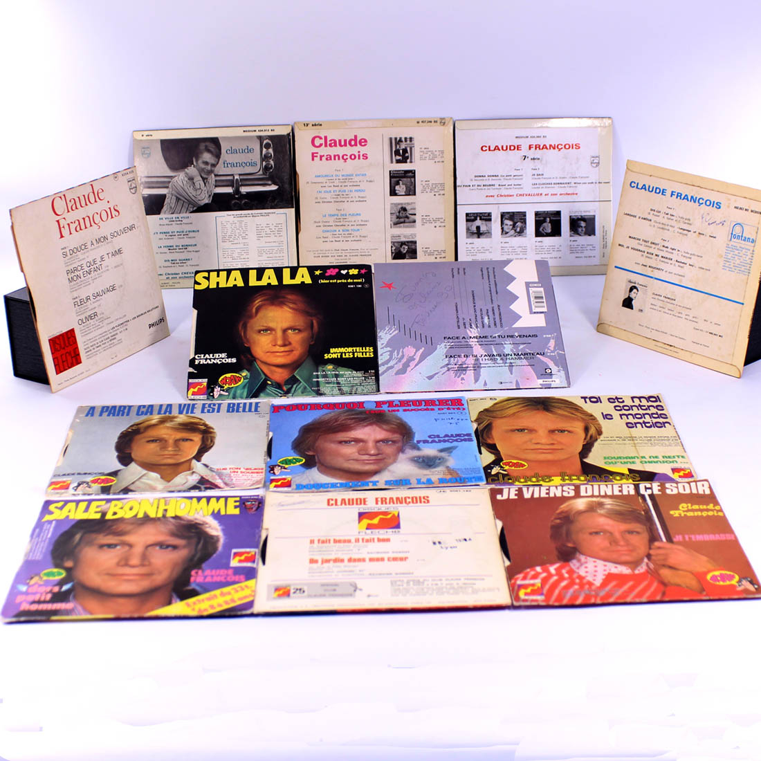 Voir photo 4 de Lot de 13 vinyles 45T de Claude François Lot de 13 vinyles 45T de Claude François État correct - Vue 4 -
